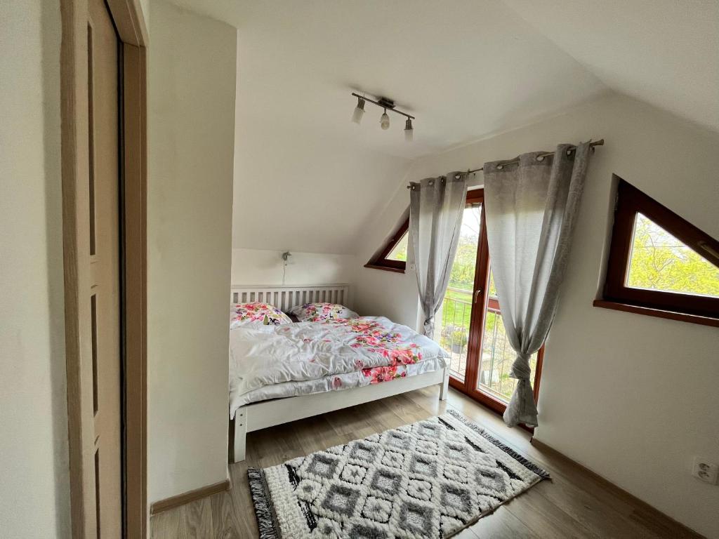 Postel nebo postele na pokoji v ubytování Celý dům FLORA v Českosaském Švýcarsku