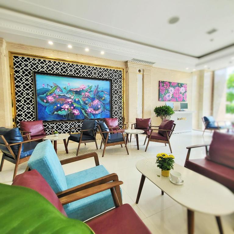 TV a/nebo společenská místnost v ubytování Alani Sea View Hotel