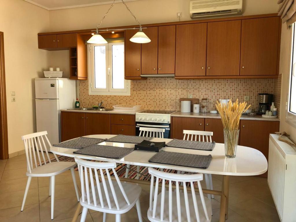 Kuchyň nebo kuchyňský kout v ubytování Helianthus Apartments