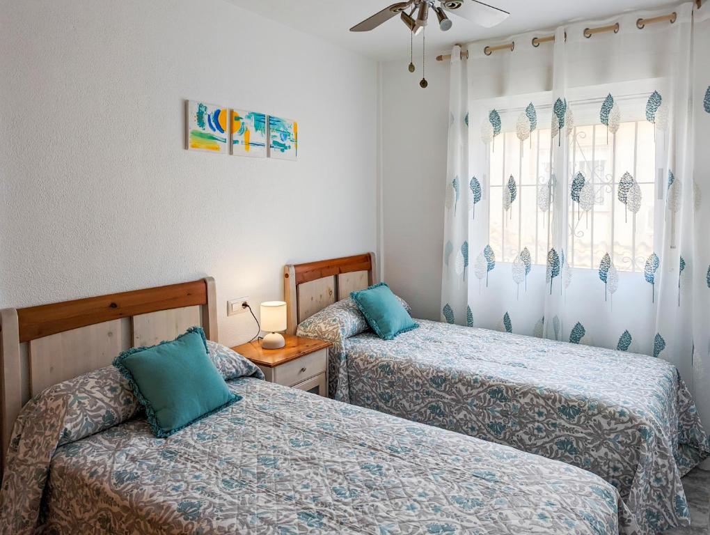 Postel nebo postele na pokoji v ubytování Ruidera Playa