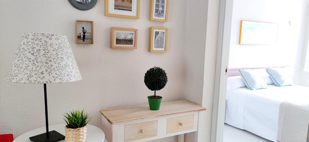 Postel nebo postele na pokoji v ubytování Apartamento Oasis Beach