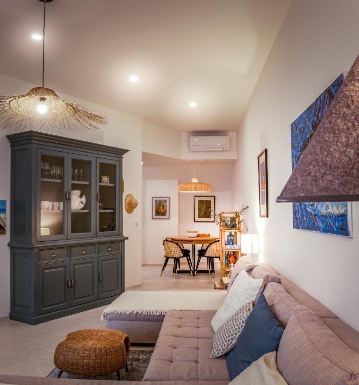 a living room with a couch and a table at Apartment Nobilis in Zambratija
