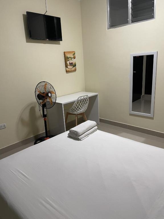 Sjónvarps- og/eða afþreyingartæki á Hotel Calmelia