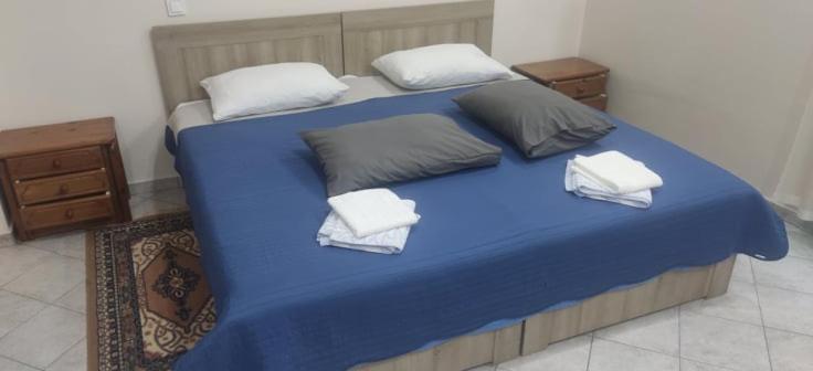 Postel nebo postele na pokoji v ubytování STADIUM