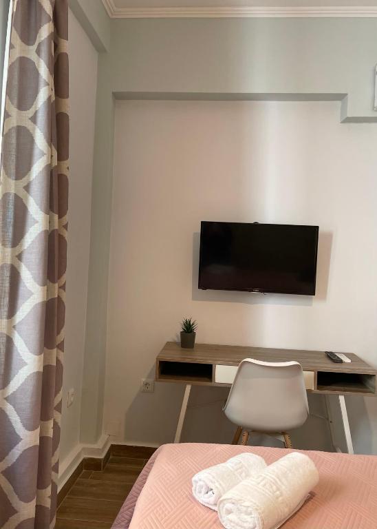 TV a/nebo společenská místnost v ubytování Armonia Porta Remounda Apartment