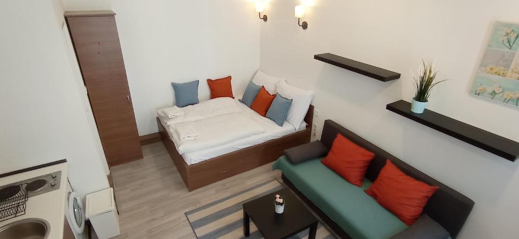 Lova arba lovos apgyvendinimo įstaigoje Osvat Apartments
