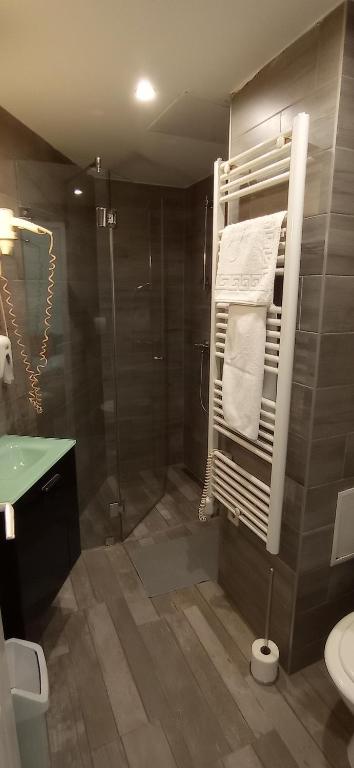 Koupelna v ubytování Osvat Apartments