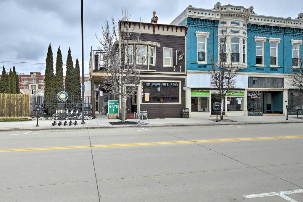 an empty street in a city with buildings at Downtown Sheboygan Apartment with Private Deck! in Sheboygan