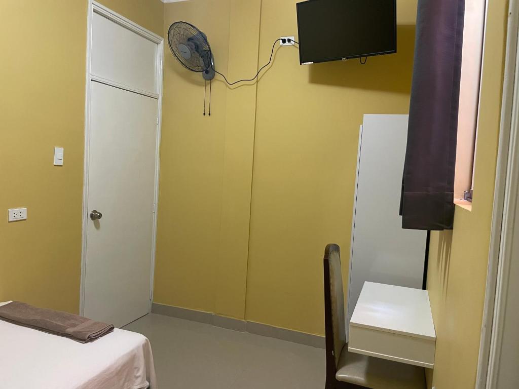 Rúm í herbergi á Hotel Calmelia