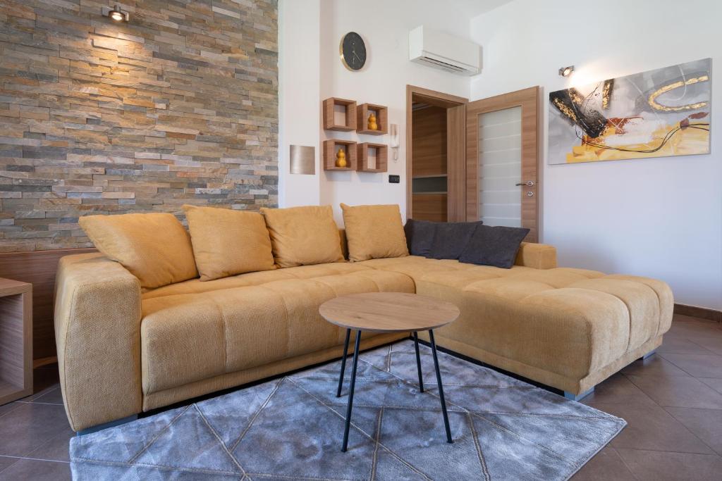 Posezení v ubytování Penthouse Gea