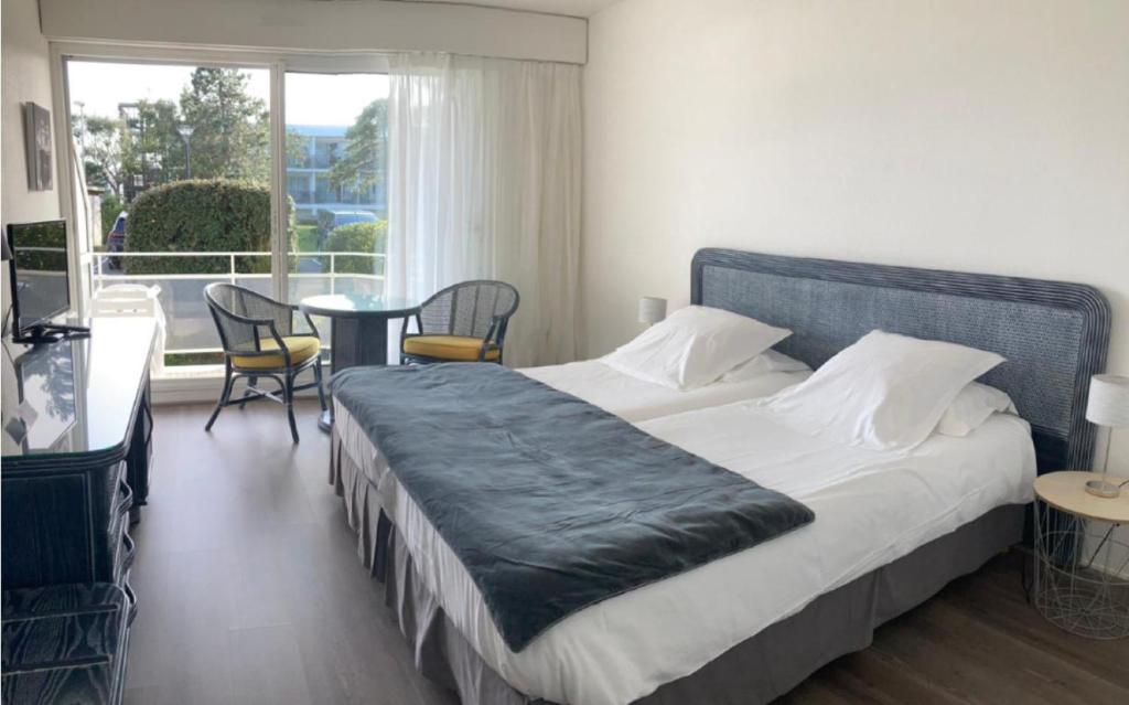 Postel nebo postele na pokoji v ubytování Louison Appart & Suite