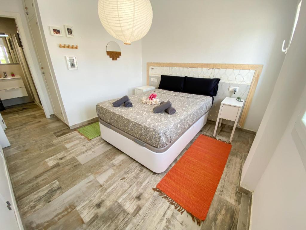 Postel nebo postele na pokoji v ubytování Tarifa Cozy House - Eolo Beach - Parking Wifi