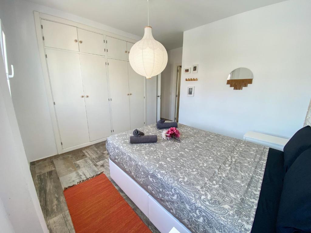Postel nebo postele na pokoji v ubytování Tarifa Cozy House - Eolo Beach - Parking Wifi