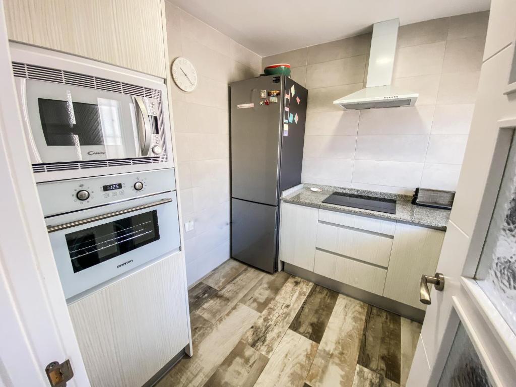 Kuchyň nebo kuchyňský kout v ubytování Tarifa Cozy House - Eolo Beach - Parking Wifi