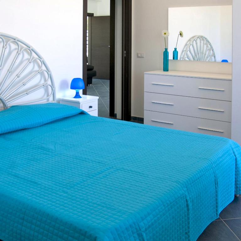 A bed or beds in a room at Villa Amateia