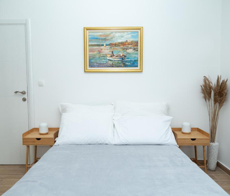Postel nebo postele na pokoji v ubytování Plamenatz studio apartments