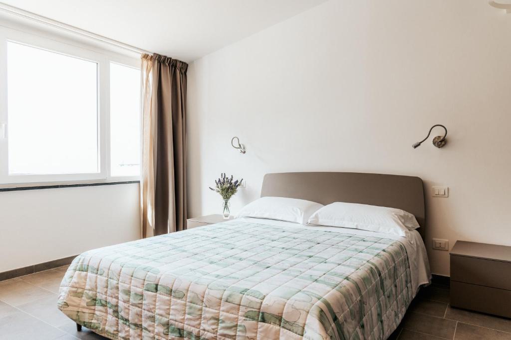 Postel nebo postele na pokoji v ubytování LA RIPA