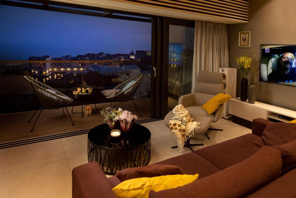 Televízia a/alebo spoločenská miestnosť v ubytovaní Apartment MaR