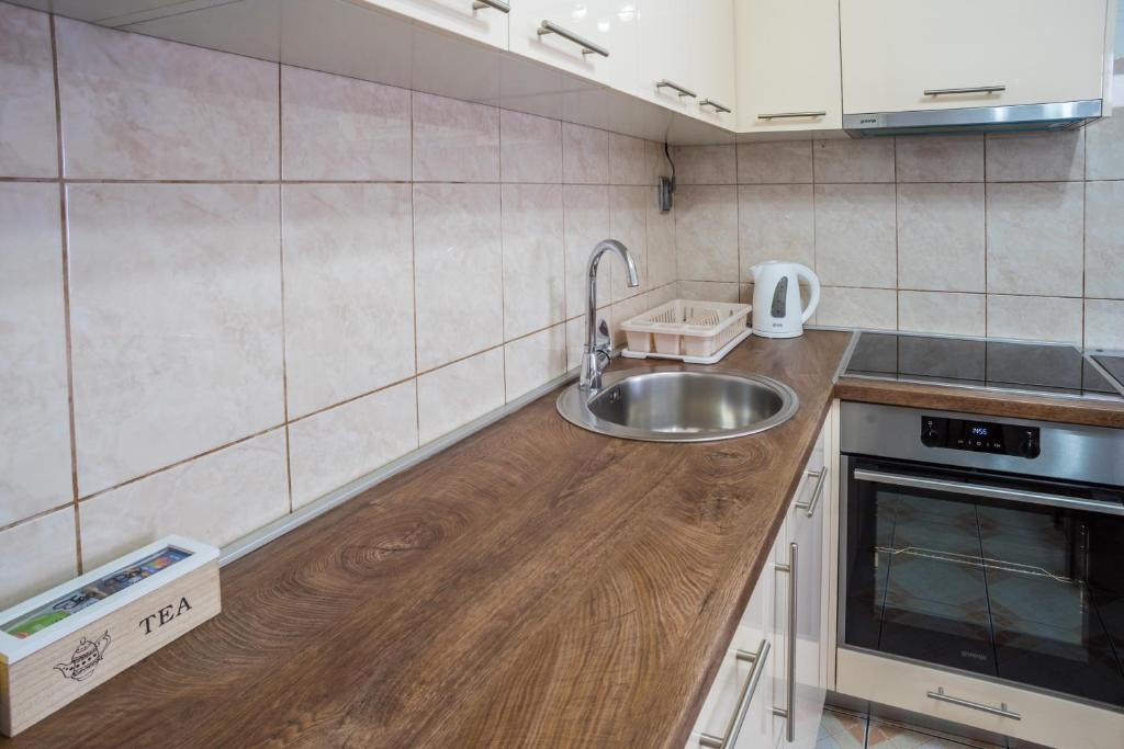 Kuchyň nebo kuchyňský kout v ubytování Vojinovic Apartman