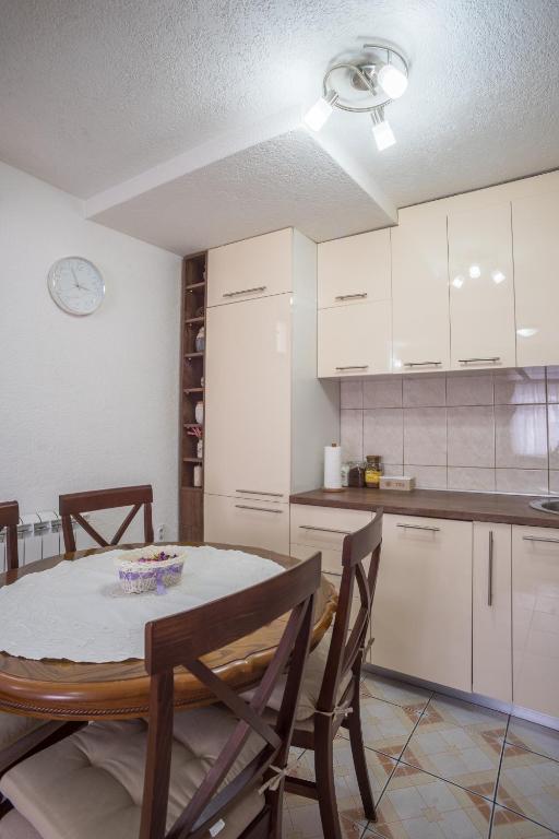Kuchyň nebo kuchyňský kout v ubytování Vojinovic Apartman