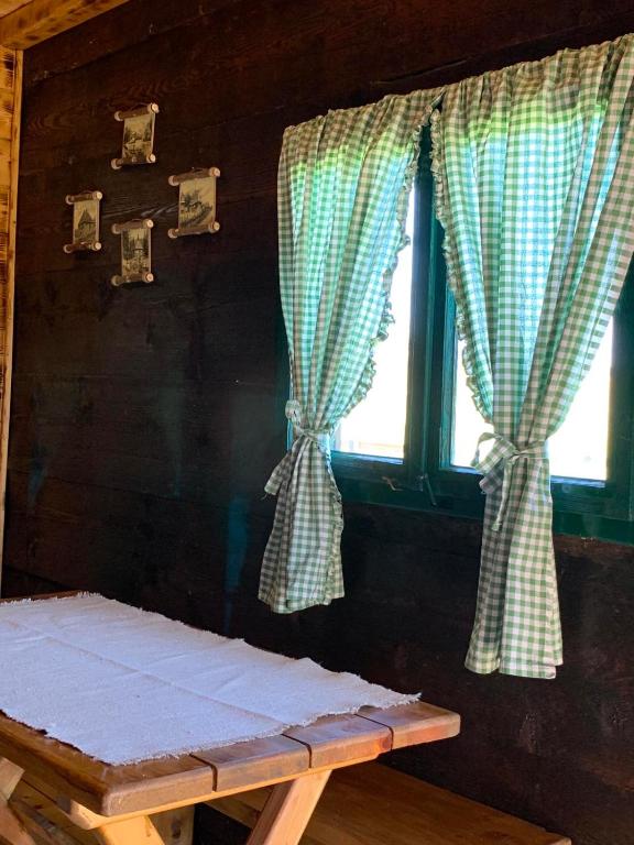 Postel nebo postele na pokoji v ubytování Etno brvnara TAMARA