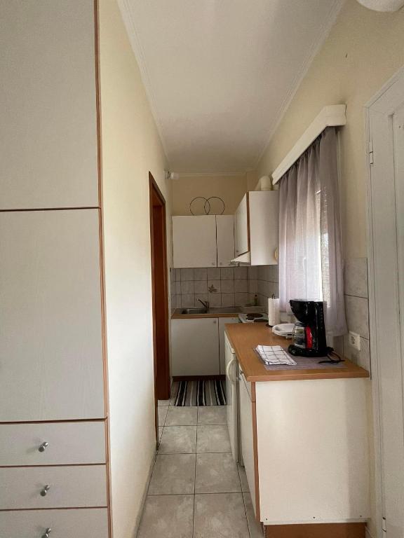 Kuchyň nebo kuchyňský kout v ubytování Flo's Apartment