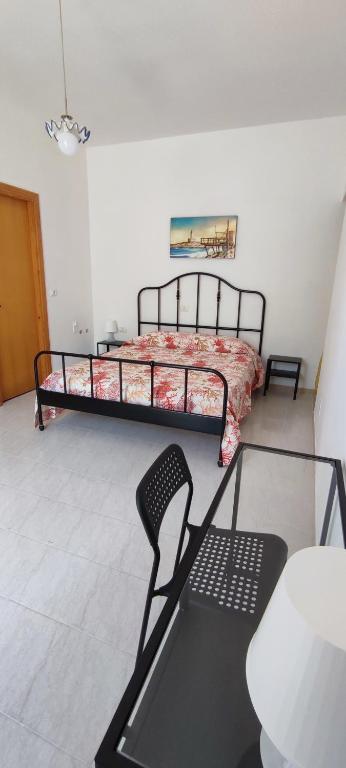 Postel nebo postele na pokoji v ubytování Villa Monacis Guest House