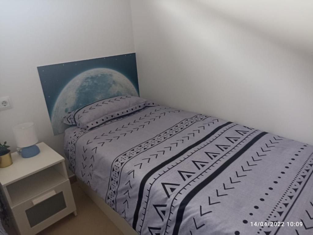 Postel nebo postele na pokoji v ubytování Fabuloso Atico En Terrazas De La Torre