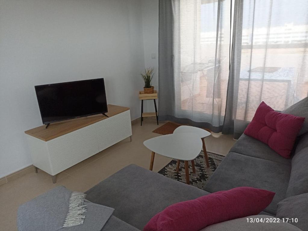TV a/nebo společenská místnost v ubytování Fabuloso Atico En Terrazas De La Torre