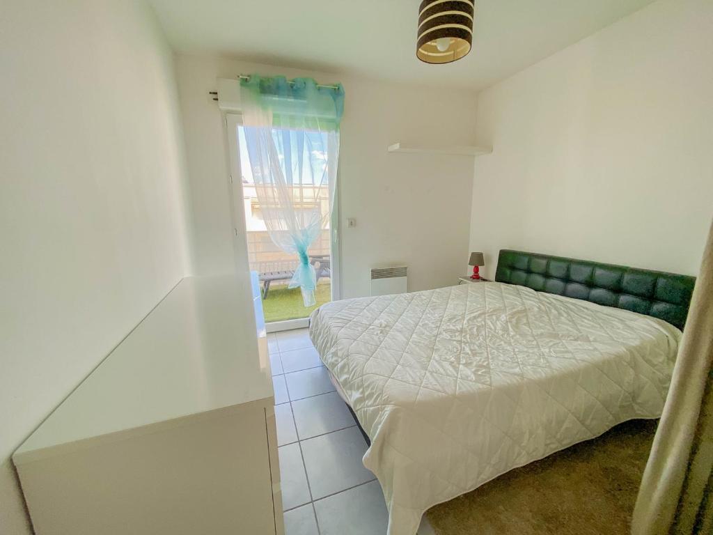 Postel nebo postele na pokoji v ubytování SUPERBE APPARTEMENT 47 m2, TRES CALME