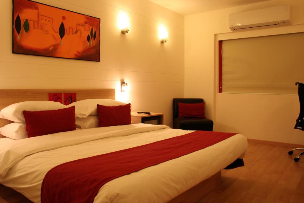 Postel nebo postele na pokoji v ubytování Red Fox by Lemon Tree Hotels, Jaipur