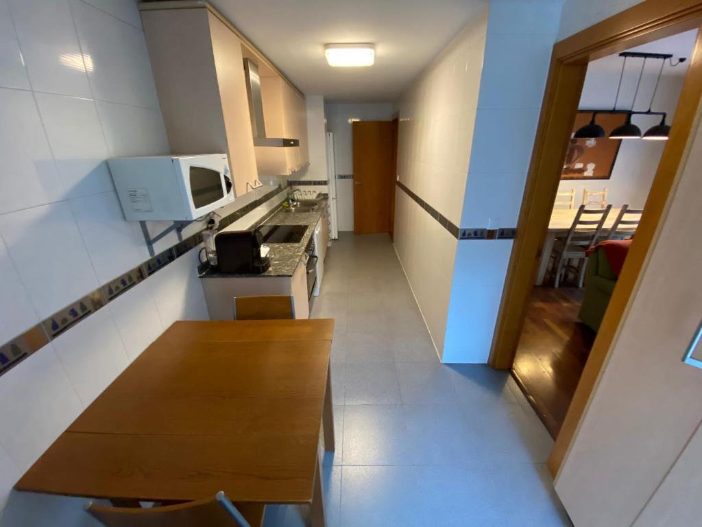 Kuchyň nebo kuchyňský kout v ubytování Apartamento tranquilo Vielha Centro con Parking Gratuito