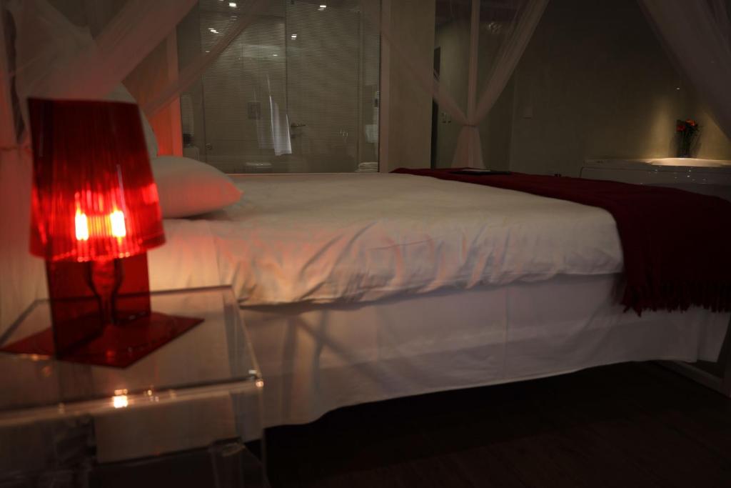 Postel nebo postele na pokoji v ubytování Adelphi Boutique Hotel