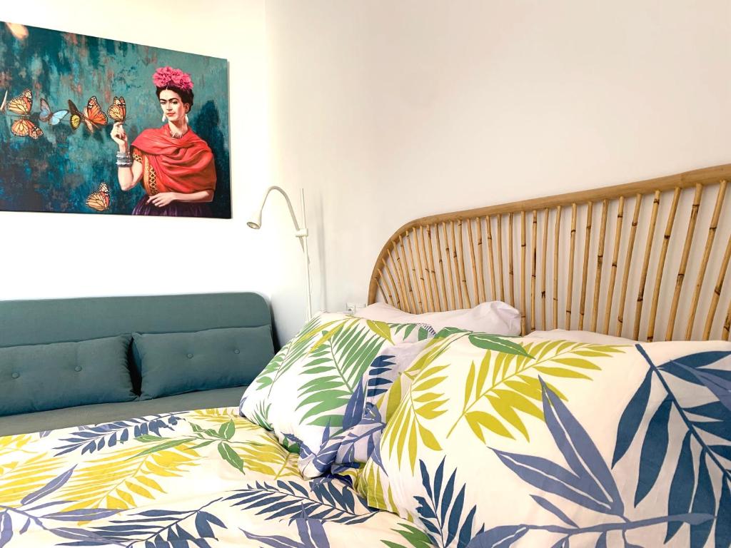 Postel nebo postele na pokoji v ubytování BENALMADENA BOLBORETA STUDIO