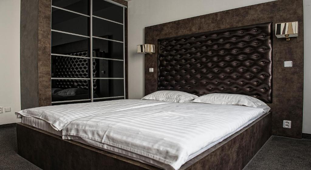 Postel nebo postele na pokoji v ubytování Hotel Polo
