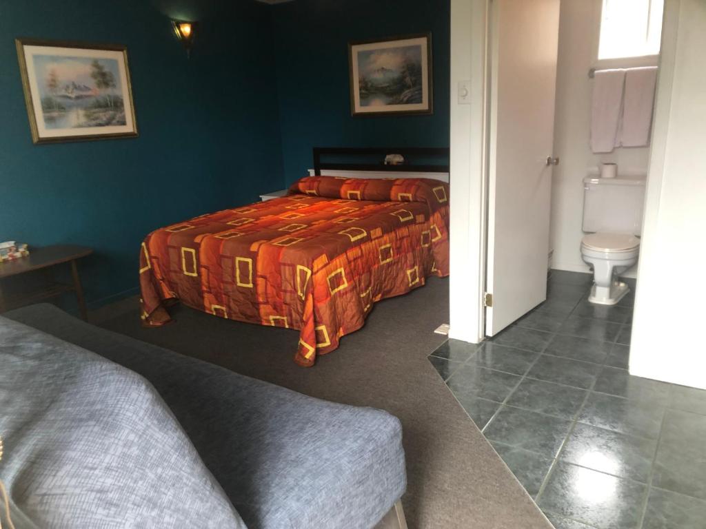Postel nebo postele na pokoji v ubytování Motel Le Voyageur