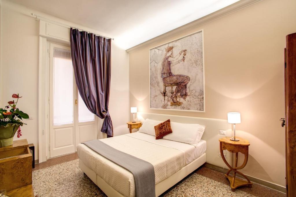 Posteľ alebo postele v izbe v ubytovaní Roma In Una Stanza Guesthouse
