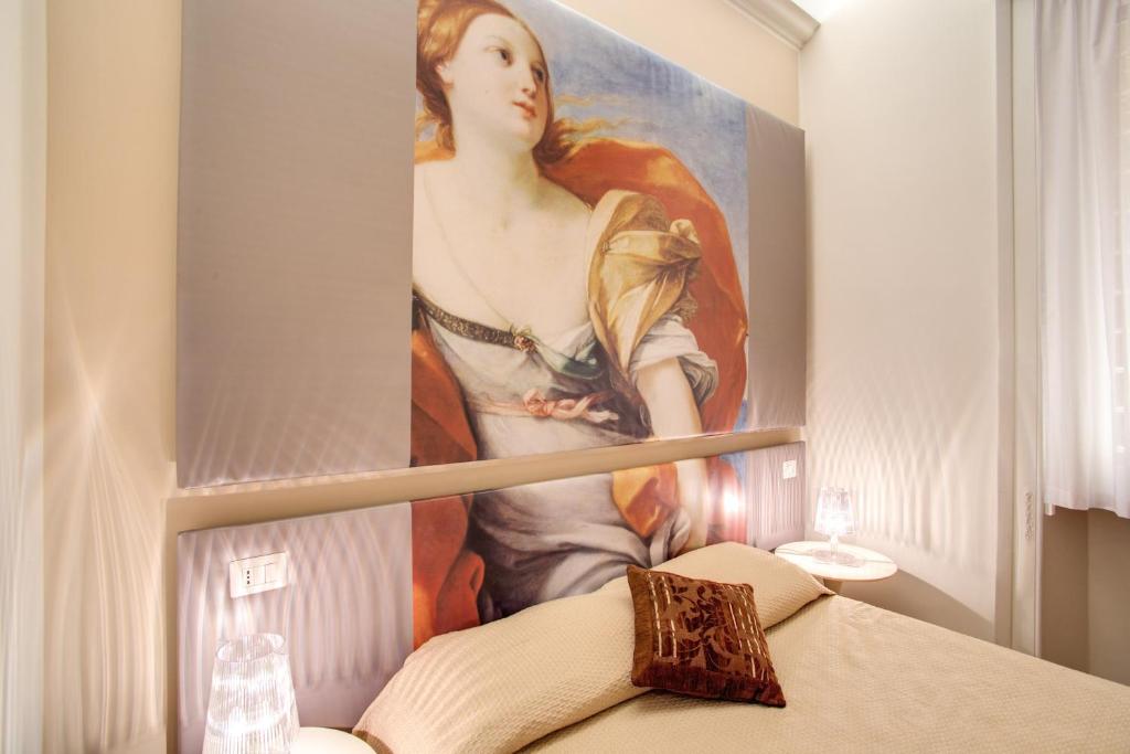 Posteľ alebo postele v izbe v ubytovaní Roma In Una Stanza Guesthouse