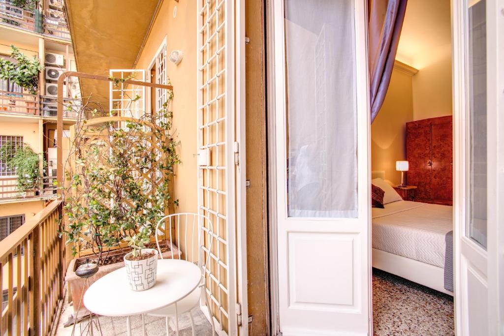 Posteľ alebo postele v izbe v ubytovaní Roma In Una Stanza Guesthouse