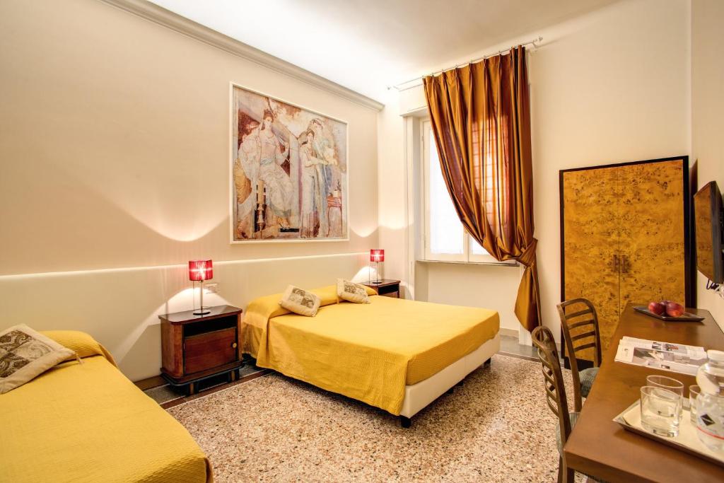 Posteľ alebo postele v izbe v ubytovaní Roma In Una Stanza Guesthouse