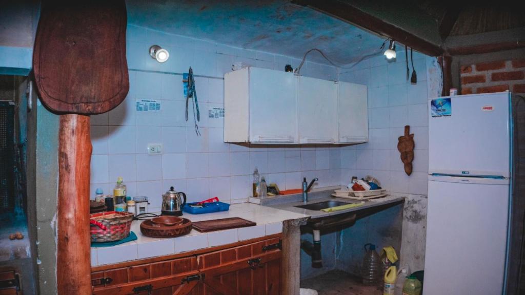Kuchyň nebo kuchyňský kout v ubytování Hotel alamos de la puntilla