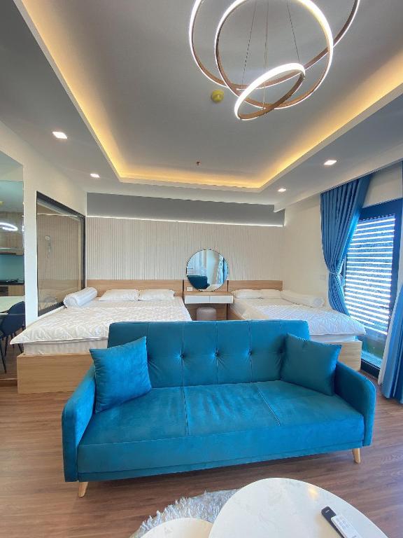 Postel nebo postele na pokoji v ubytování FLC Sea Tower Quy Nhơn - VIP HOUSE