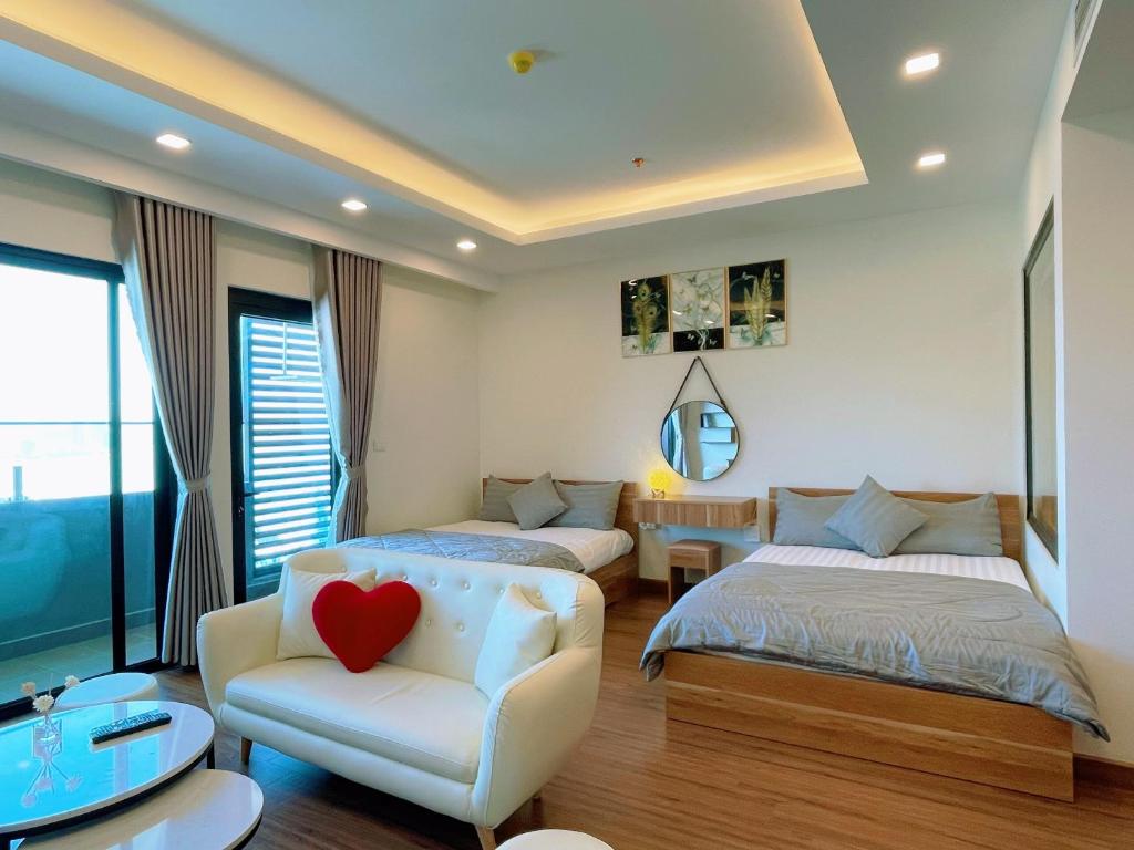 Postel nebo postele na pokoji v ubytování FLC Sea Tower Quy Nhơn - VIP HOUSE