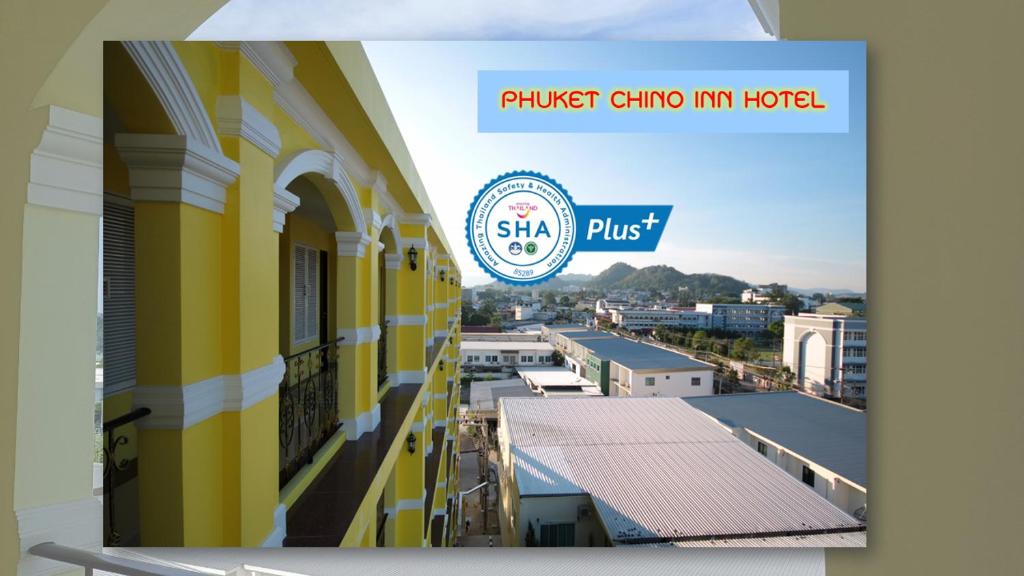 a view of a building with a sign for a hotel at Phuket Chinoinn-SHAPlus Certified in Phuket Town