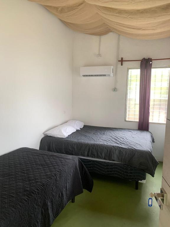 Postel nebo postele na pokoji v ubytování Hotel Chulamar, Piscina y Restaurante