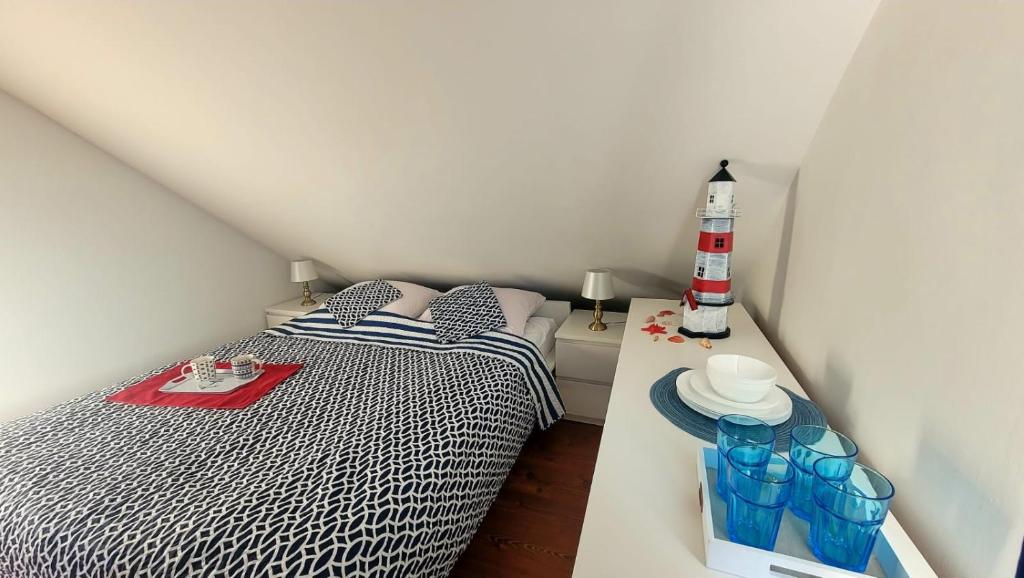 Postel nebo postele na pokoji v ubytování Willa Heljan Międzywodzie