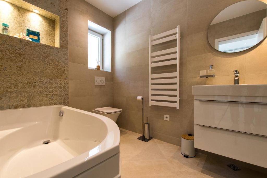 Kúpeľňa v ubytovaní Villa Smaragd - Perle - Luxury Apartments With Shared Pool