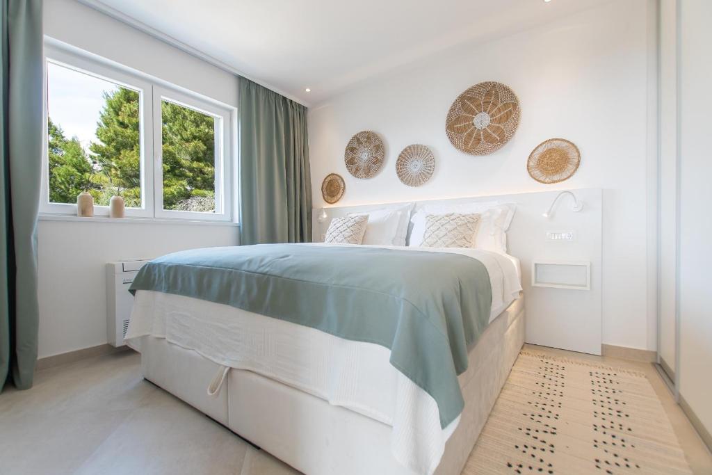 Posteľ alebo postele v izbe v ubytovaní Villa Smaragd - Perle - Luxury Apartments With Shared Pool
