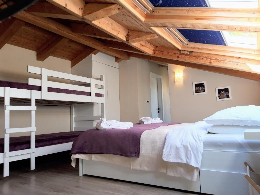 Postel nebo postele na pokoji v ubytování Villa Aurelia