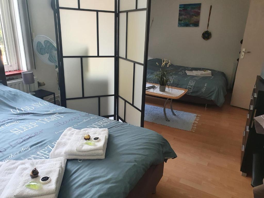 Een bed of bedden in een kamer bij BnbMarlies